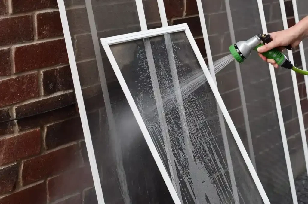 washing window screens with water hose washing window screens with water hose
